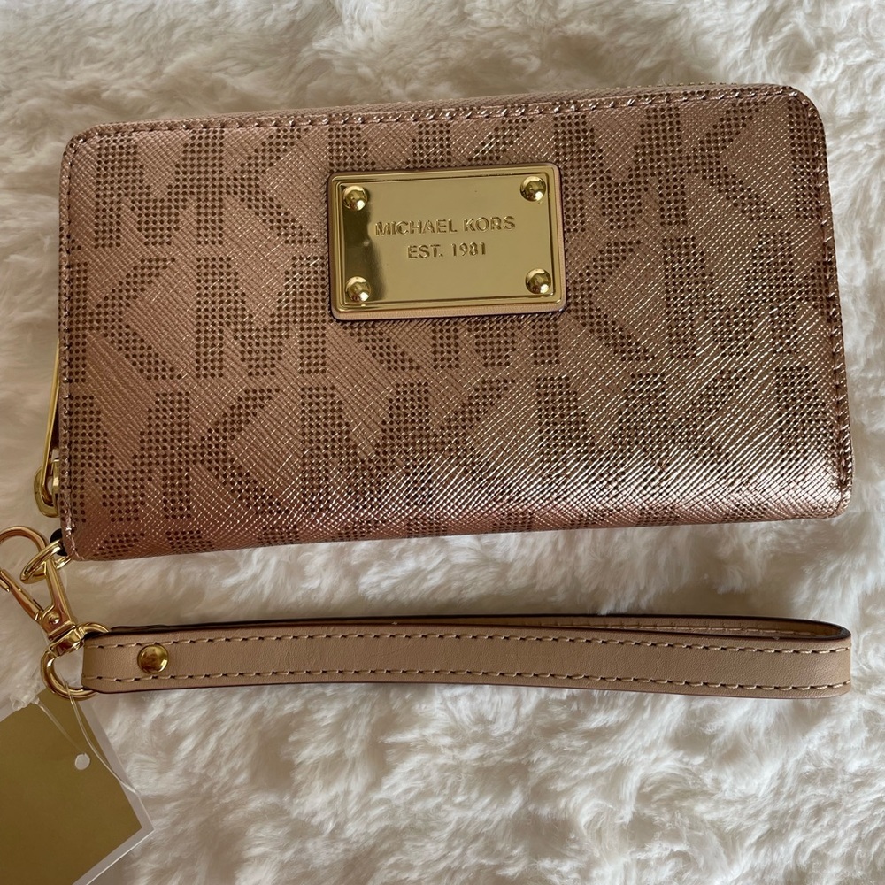 Michael Kors rose gold wristlet brand new with tags